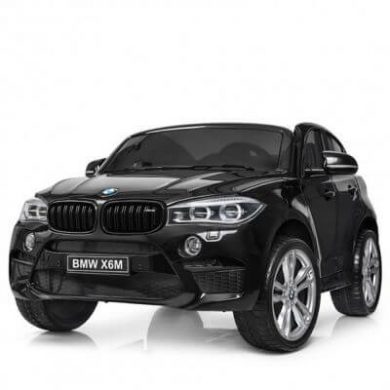 Masinuta electrica BMW X6 M XXL Black cu doua locuri si roti de cauciuc Masinuta electrica BMW X6 M XXL Black cu doua locuri si roti de cauciuc